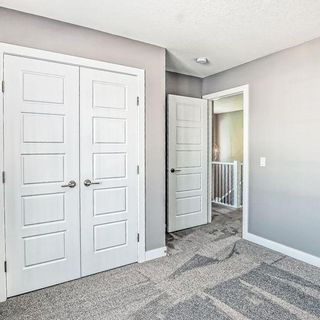 Photo 32: 157 Waterford Boulevard: Chestermere Row/Townhouse for sale : MLS®# A1250958