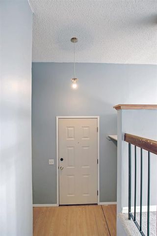 Photo 2: 77 Edgehill Drive NW in Calgary: Edgemont Semi Detached (Half Duplex) for sale : MLS®# A2001560