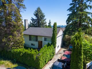 Photo 4: 1002 DANSEY Avenue in Coquitlam: Central Coquitlam House for sale : MLS®# R2784121