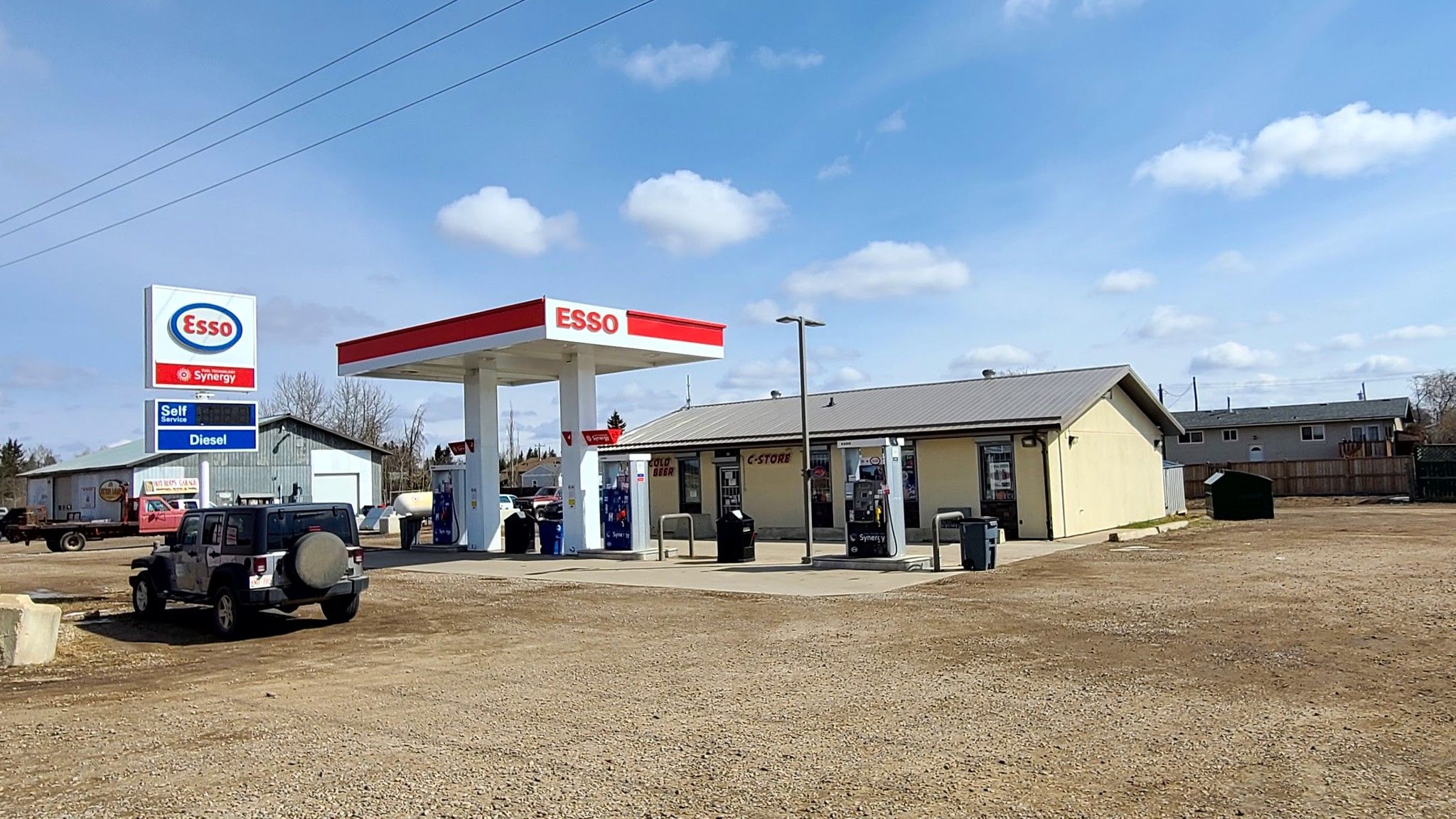 Main Photo: ESSO gas station for sale Alberta: Business with Property for sale : MLS®# 1018367