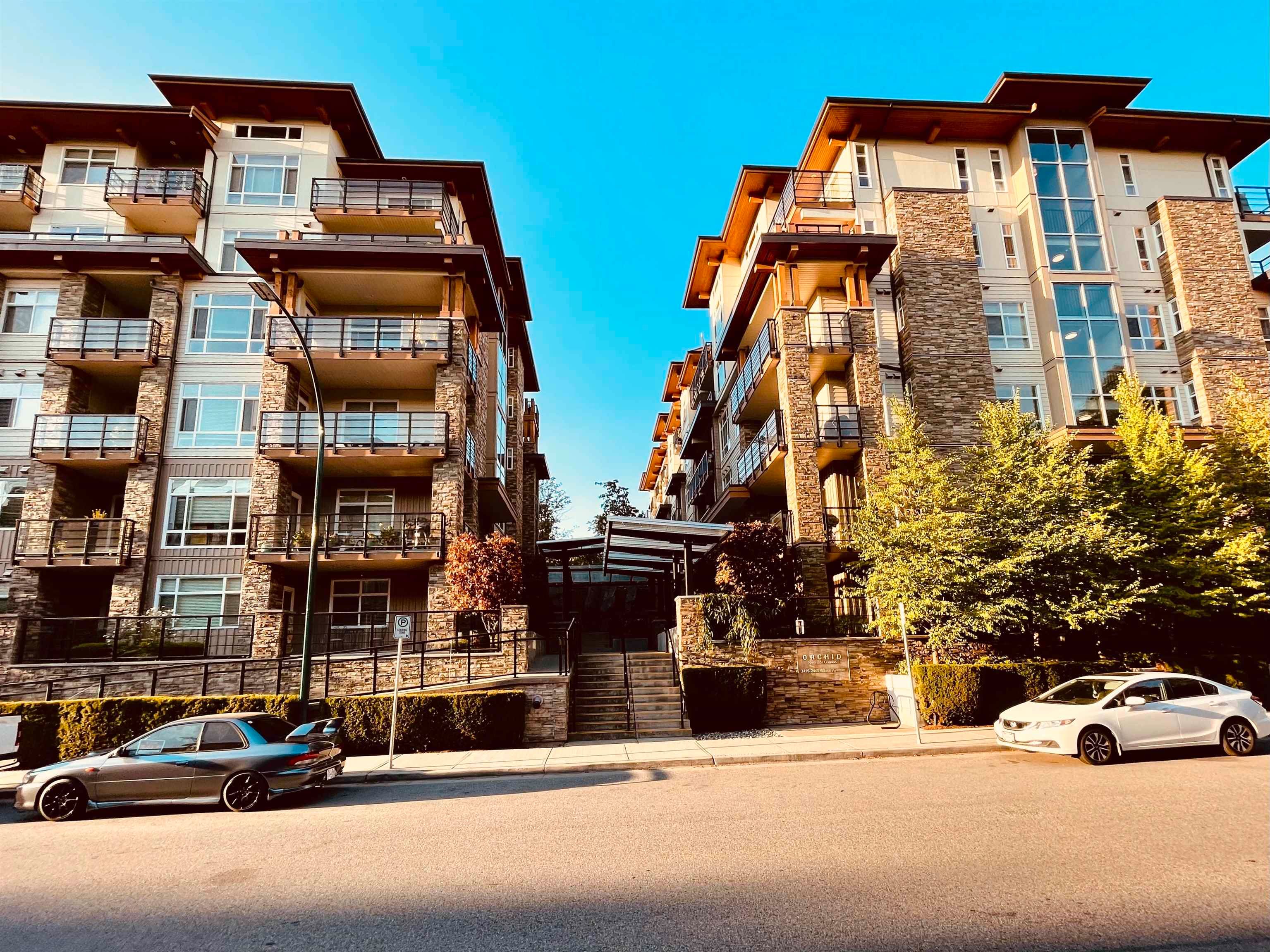 Main Photo: 210 2465 WILSON Avenue in Port Coquitlam: Central Pt Coquitlam Condo for sale in "ORCHID RIVERSIDE" : MLS®# R2782120
