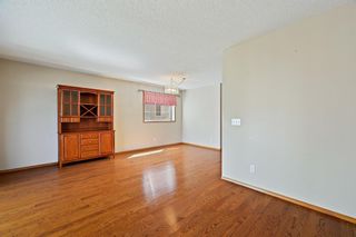 Photo 4: 41 Sun Harbour Road SE in Calgary: Sundance Row/Townhouse for sale : MLS®# A1218017