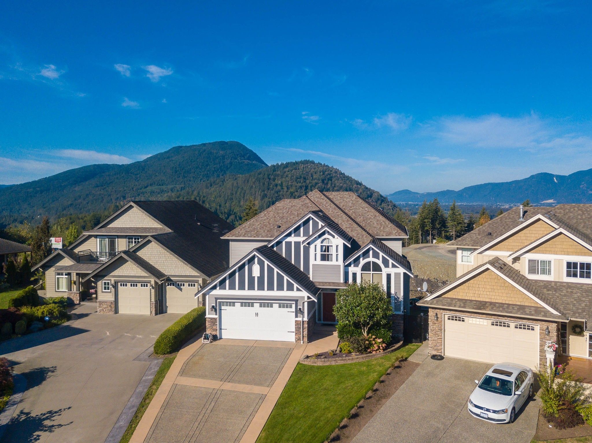 Welcome to 5213 Demontigny Court! This beautiful home is located in Sherwood Estates on the top of Promontory with Cultus Lake and Panoramic Western Sunset views. Relax on your back porch or in the yard with the kids and feel at home!