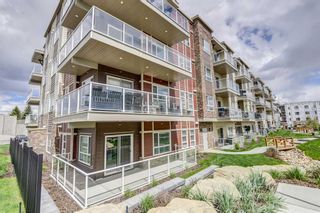 Photo 1: 108 360 Harvest Hills Common NE in Calgary: Harvest Hills Apartment for sale : MLS®# A1134975