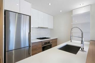 Photo 7: 207 138 Waterfront Court SW in Calgary: Chinatown Apartment for sale : MLS®# A2129206