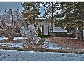 Photo 1: 11159 BRAESIDE Drive SW in Calgary: Braeside_Braesde Est House for sale : MLS®# C3653230