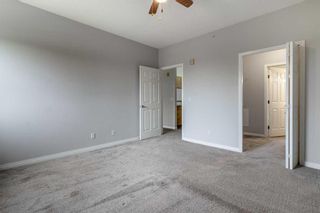 Photo 22: 316 2022 Canyon Meadows Drive SE in Calgary: Queensland Apartment for sale : MLS®# A2059840