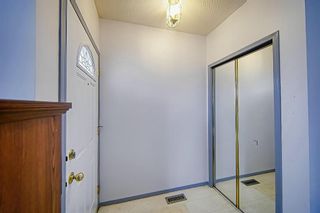 Photo 5: 115 Erin Meadow Green SE in Calgary: Erin Woods Detached for sale : MLS®# A2042365