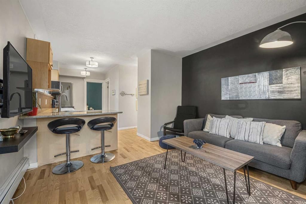 Main Photo: 1 2417 2 Street SW in Calgary: Mission Apartment for sale : MLS®# A2080028