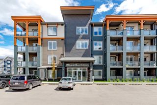 Photo 1: 211 100 Auburn Meadows Manor SE in Calgary: Auburn Bay Apartment for sale : MLS®# A1220075