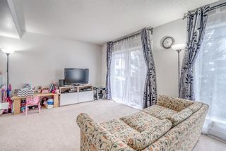 Photo 5: 221 Bridlewood Lane SW in Calgary: Bridlewood Row/Townhouse for sale : MLS®# A1175689