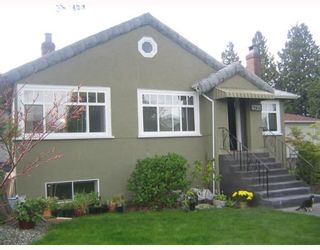 Photo 1: 4725 CLARENDON Street in Vancouver: Collingwood VE House for sale (Vancouver East)  : MLS®# V709852