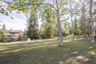 Photo 39: 106 Strathlorne Mews SW in Calgary: Strathcona Park Row/Townhouse for sale : MLS®# A1174641