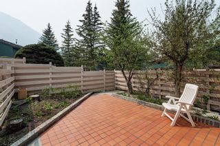 Photo 3: 140 Nahanni Drive: Banff Row/Townhouse for sale : MLS®# A2049965