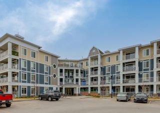 Photo 1: 207 110 Auburn Meadows View SE in Calgary: Auburn Bay Apartment for sale : MLS®# A1213346