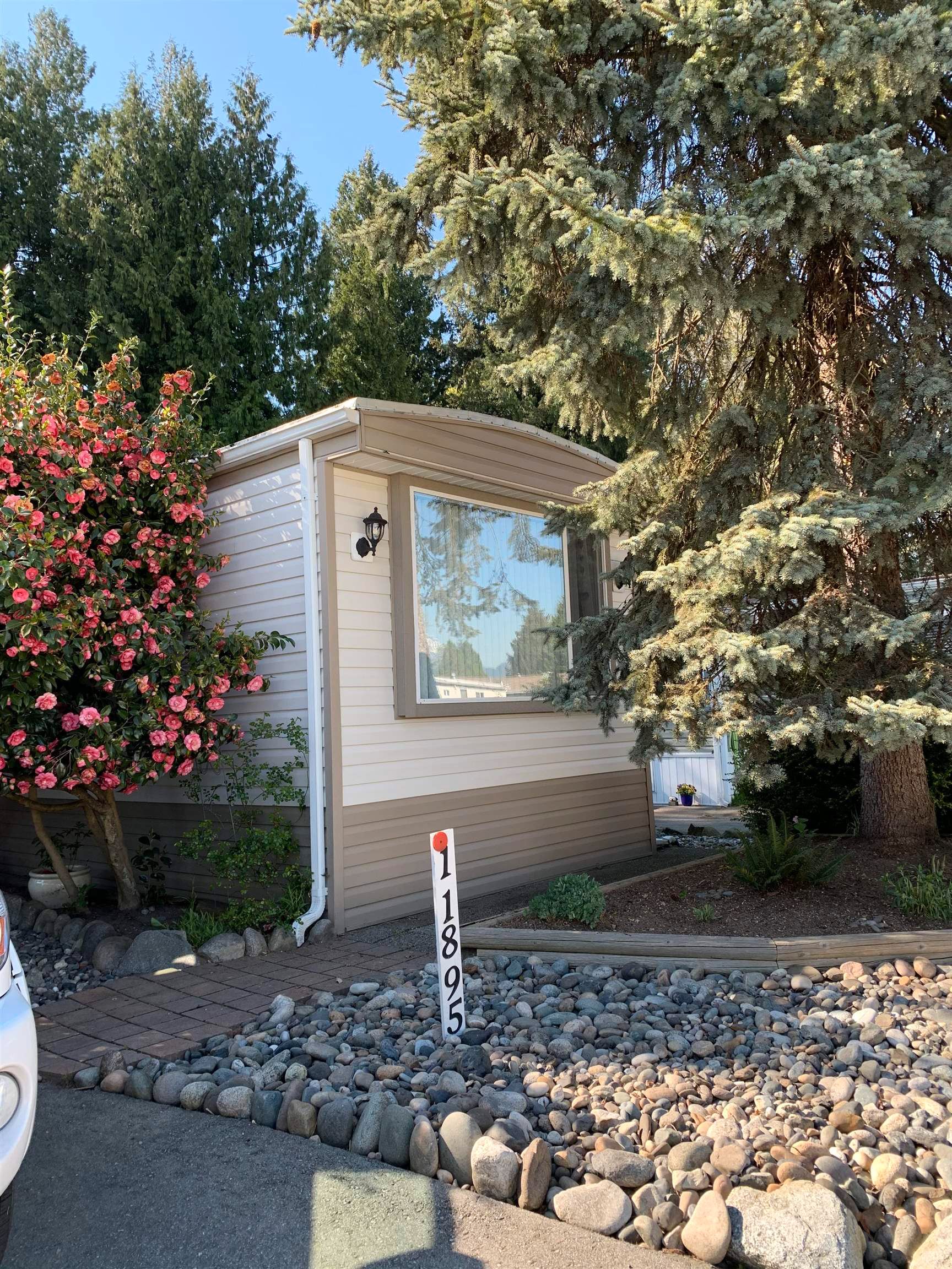 Main Photo: 63 11895 PINYON DRIVE in Pitt Meadows: Central Meadows Manufactured Home for sale : MLS®# R2625512
