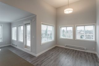 Photo 15: 504 2229 ATKINS Avenue in Port Coquitlam: Central Pt Coquitlam Condo for sale in "Downtown Pointe" : MLS®# R2553513