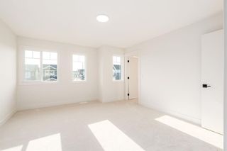 Photo 27: 102 Sundown Close: Cochrane Semi Detached (Half Duplex) for sale : MLS®# A2070990