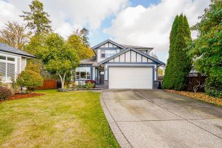 Photo 1: 6928 182A Street in Surrey: Cloverdale BC House for sale in "Cloverwoods" (Cloverdale)  : MLS®# R2734986