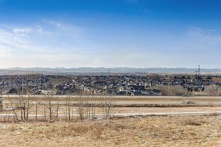 Photo 1: 14 169 Rockyledge View NW in Calgary: Rocky Ridge Row/Townhouse for sale : MLS®# A1159449