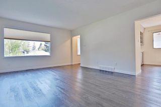 Photo 3: 1427 & 1429 Rosehill Drive NW in Calgary: Rosemont Full Duplex for sale : MLS®# A1253117
