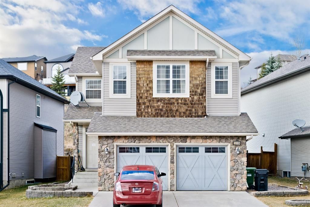 Main Photo: 319 St Moritz Drive SW in Calgary: Springbank Hill Detached for sale : MLS®# A1229853