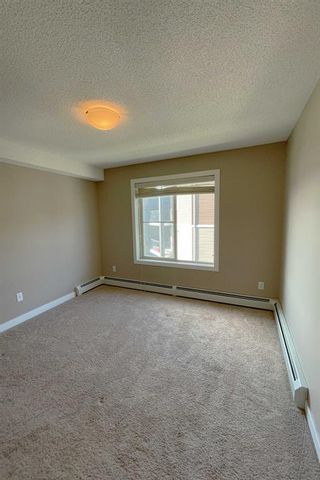 Photo 8: 402 7210 80 Avenue NE in Calgary: Saddle Ridge Apartment for sale : MLS®# A2001799