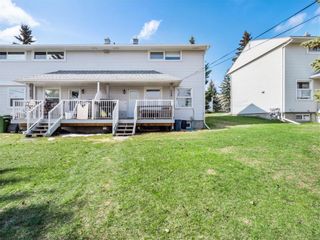 Photo 27: 664 Merrill Drive NE in Calgary: Winston Heights/Mountview Row/Townhouse for sale : MLS®# A1194199