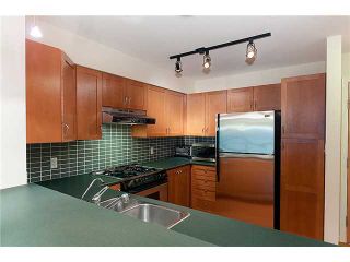 Photo 4: 302 2161 W 12TH Avenue in Vancouver: Kitsilano Condo for sale in "CARLINGS" (Vancouver West)  : MLS®# V909987