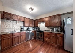 Photo 2: 2005 145 Point Drive NW in Calgary: Point McKay Apartment for sale : MLS®# A2053242