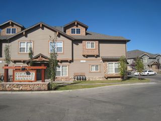 Main Photo: 104 141 Panatella Landing NW in Calgary: Panorama Hills Row/Townhouse for sale : MLS®# A2049580