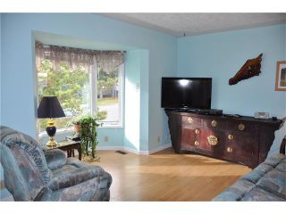 Photo 2: 204 Frontenac Avenue: Turner Valley House for sale : MLS®# C4078819