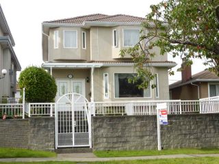 Photo 1: 135 W 63RD Avenue in Vancouver: Marpole House for sale (Vancouver West)  : MLS®# R2077959
