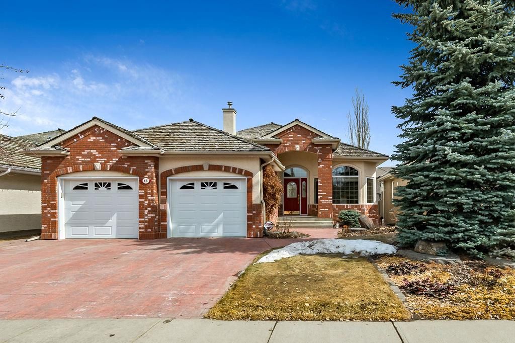 Main Photo: 65 Evergreen Crescent SW in Calgary: Evergreen Detached for sale : MLS®# A2039748