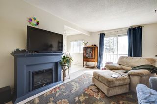 Photo 2: 10807 5 Street SW in Calgary: Southwood Semi Detached for sale : MLS®# A1224408