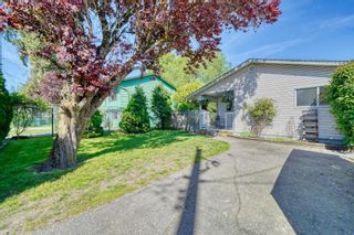 Photo 1: 5240 201A Street in Langley: Langley City House for sale : MLS®# R2881620