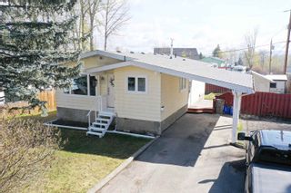 Photo 1: 400 PIERCE Crescent in Quesnel: Quesnel - Town House for sale in "Uplands" : MLS®# R2878077