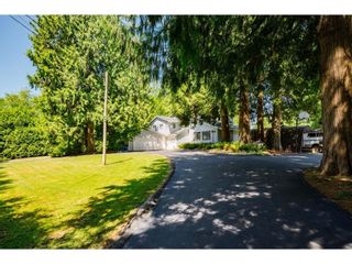 Photo 2: 26019 58 Avenue in Langley: County Line Glen Valley House for sale : MLS®# R2599684