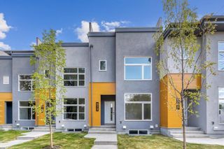 Photo 1: 512 32 Street NW in Calgary: Parkdale Row/Townhouse for sale : MLS®# A2050532