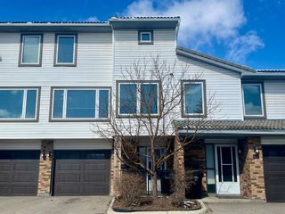 Main Photo: 117 Coachway Lane SW in Calgary: Coach Hill Row/Townhouse for sale : MLS®# A2117609