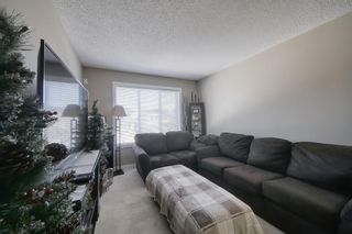 Photo 7: 555 Panatella Boulevard NW in Calgary: Panorama Hills Row/Townhouse for sale : MLS®# A2034434