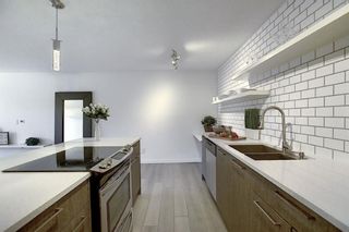 Photo 3: 203 809 4 Street NE in Calgary: Renfrew Apartment for sale : MLS®# A2118564