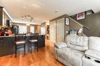 Photo 7: 257 RAINBOW FALLS Manor: Chestermere Row/Townhouse for sale : MLS®# A2128933