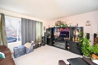 Photo 9: 128 Everridge Way SW in Calgary: Evergreen Detached for sale : MLS®# A1175019