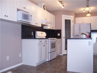 Photo 6: 415 STONEGATE Rise NW: Airdrie Residential Attached for sale : MLS®# C3442625