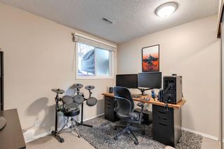 Photo 18: 156 Oaktree Lane SW in Calgary: Oakridge Semi Detached (Half Duplex) for sale : MLS®# A2051256