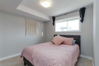 Photo 11: PRAIRIE SPRINGS in Airdrie: Row/Townhouse for sale