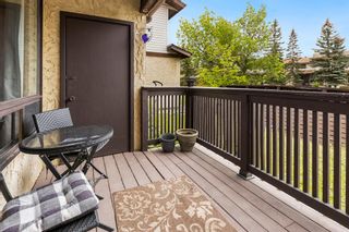 Photo 2: 12 Ranchlands Place NW in Calgary: Ranchlands Row/Townhouse for sale : MLS®# A2054640