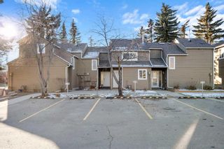 Photo 1: 103 829 Coach Bluff Crescent SW in Calgary: Coach Hill Row/Townhouse for sale : MLS®# A2095289