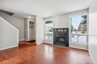 Photo 3: 29 Woodhill Court SW in Calgary: Woodlands Row/Townhouse for sale : MLS®# A2092494
